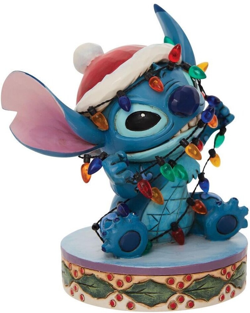 Enesco - Disney Traditions Stitch Wrapped In Xmas Lights 4.