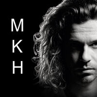 M K H