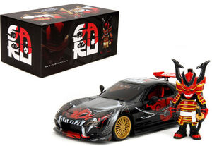 Jada Toys - 1:24 Lab Monkeys - Hollywood Rides - '93 Mazda Rx-7 with Saru Figure (Closed Box)