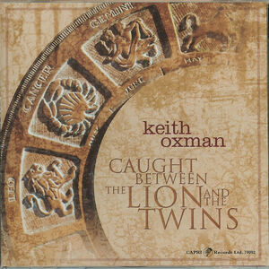 Caught Between The Lion and The Twins , Keith Oxman