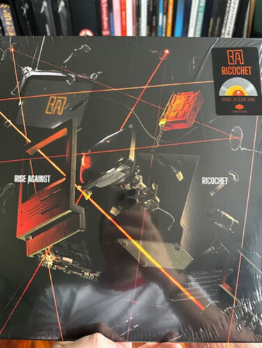 Ricochet - Limited Colored Vinyl with Opaque Orange Center & Clear Outside